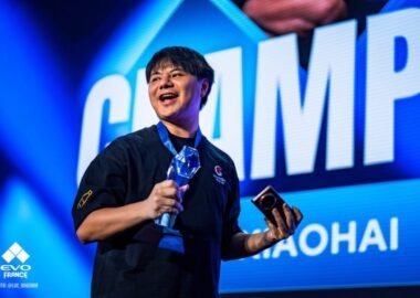 EVO France 2025 FATAL FURY Grand Finals champion XIaohai celebrating on stage following Grand Finals