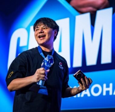 EVO France 2025 FATAL FURY Grand Finals champion XIaohai celebrating on stage following Grand Finals
