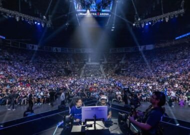 The image shows an esports competition the Evolution Championship Series (Evo), the world's largest fighting game event