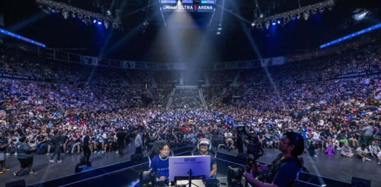 The image shows an esports competition the Evolution Championship Series (Evo), the world's largest fighting game event