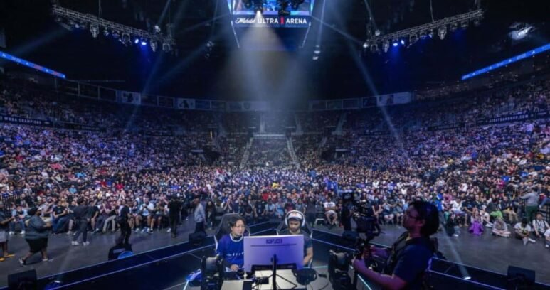 The image shows an esports competition the Evolution Championship Series (Evo), the world's largest fighting game event
