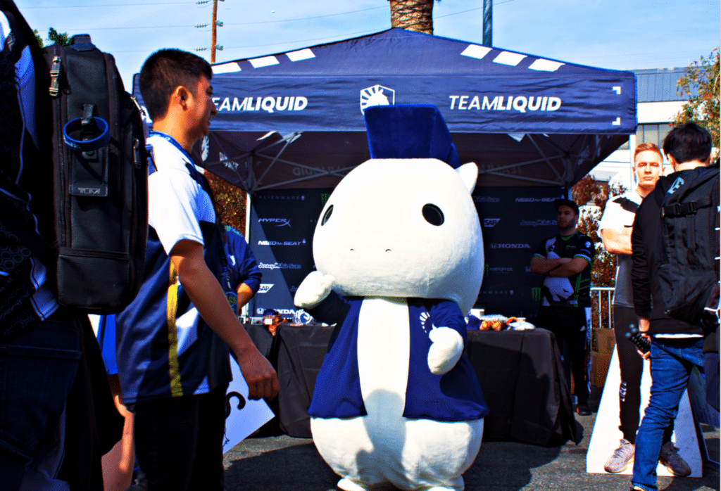 mascote azul líquido da equipe