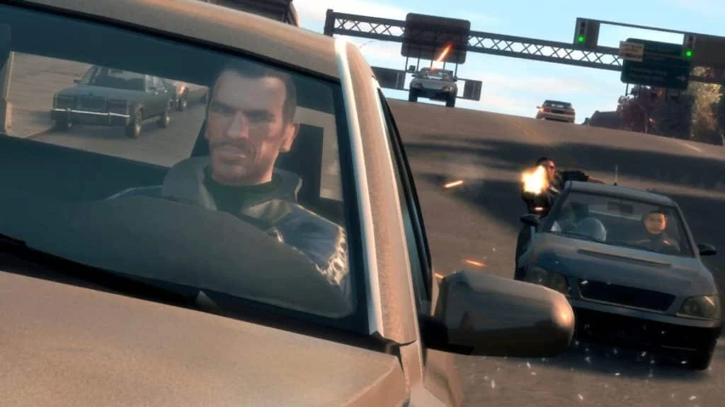 Niko Bellic em GTA IV sendo perseguido por outro carro que está atirando nele