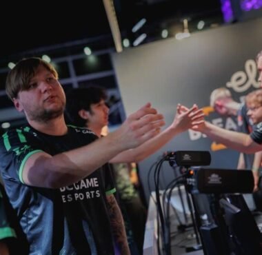 An image showing players from BC.Game shaking hands after a match at an Elisa Esports Counter-Strike event.