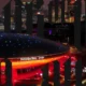 Aerial view of the Mercedes-Benz Arena in Shanghai with VALORANT Champions Shanghai 2026 branding and graphics.