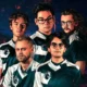 An artistic illustration of five Team Liquid Dota 2 players in team jerseys against a dark, fiery background.