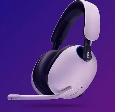 A white and black Sony INZONE gaming headset against a purple gradient background.