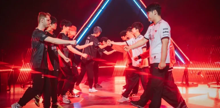 Players from Dragon Ranger Gaming and T1 shaking hands on stage at VALORANT Champions 2025