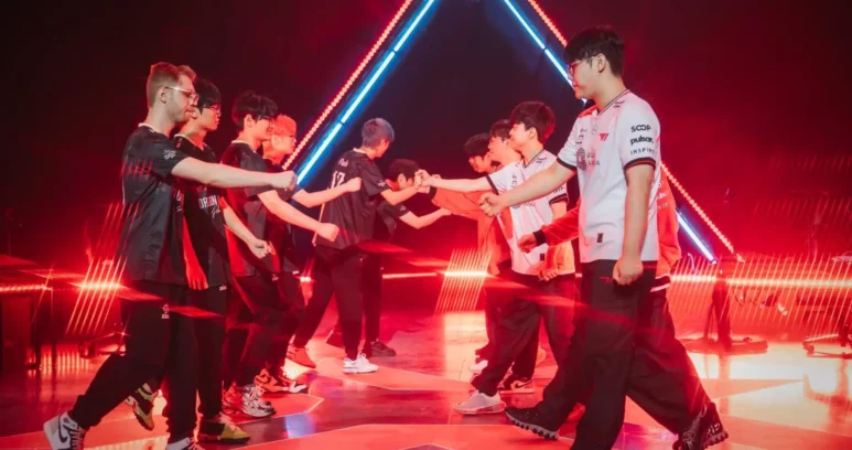 Players from Dragon Ranger Gaming and T1 shaking hands on stage at VALORANT Champions 2025