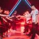 Players from Dragon Ranger Gaming and T1 shaking hands on stage at VALORANT Champions 2025